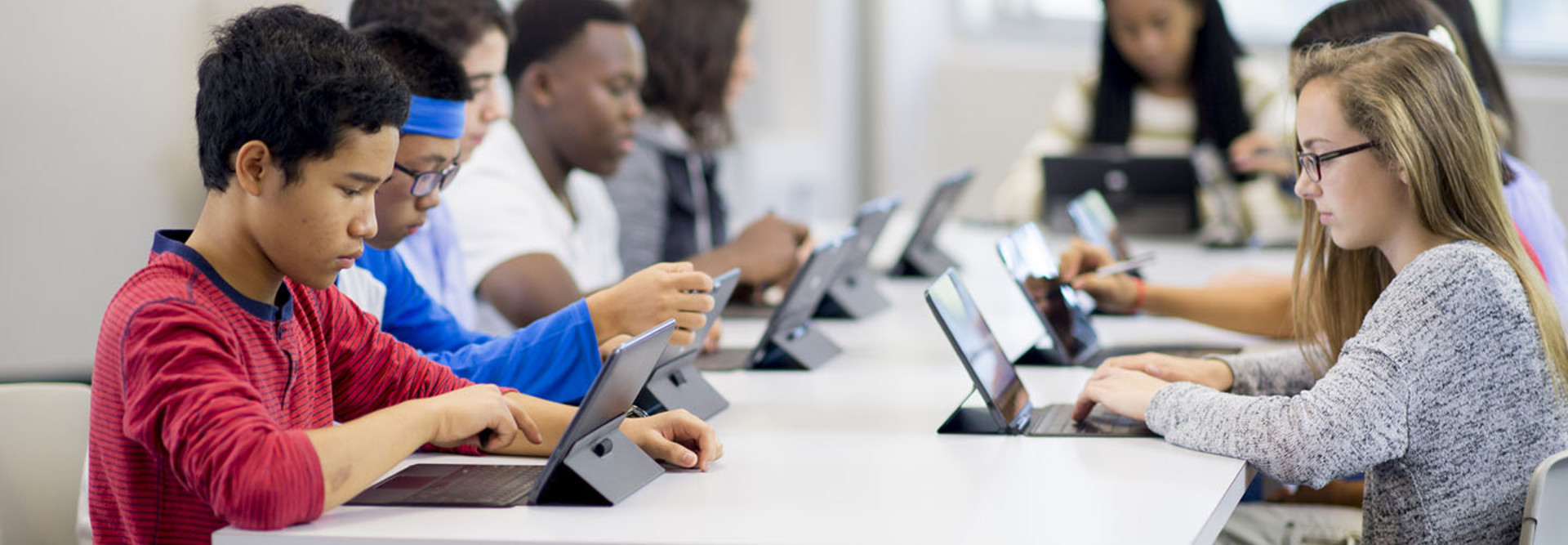 High school students working in a computer lab